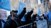 Uighurs and their supporters protest in front of the Permanent Mission of China to the United Nations in New York, March 15, 2018. Uighur Muslims protested a sweeping Chinese surveillance and security campaign that has sent thousands to detention camps.