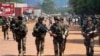 French soldiers are seen patrolling a street in Bangui on December 8, 2013. (Herve Serefio/Reuters)