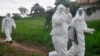 Health workers leave after they took a blood samples from a child to test for the Ebola virus in an area were a 17-year-old boy died from the virus on the outskirts of Monrovia, Liberia, June 30, 2015.