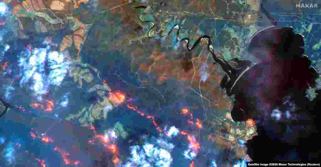 A view shows fire lines south of Eden, New South Wales, Australia, in this handout Maxar's WorldView-3 satellite image taken on Jan. 12, 2020.
