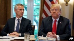 El presidente Donald Trump y el secretario general de la OTAN Jens Stoltenberg durante una reunión en la Casa Blanca. Mayo 17 de 2018.