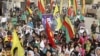 Syrian Kurds demonstrators hold flags and portraits of jailed Kurdistan Workers Party (PKK) leader Abdullah Ocalan during a protest in Derik, Al Hasakah, Syria, November 1, 2012.