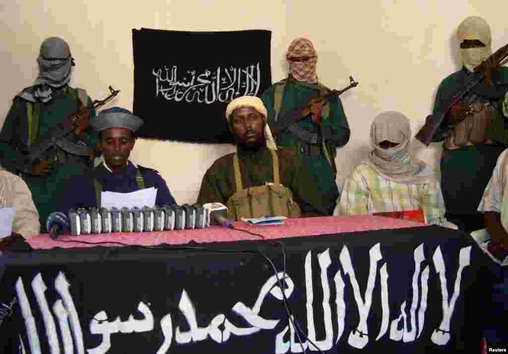 Somalia's Islamist jihadists emerged as merchants in the illegal trade of elephant ivory from the Horn of Africa, according to undercover investigators. Surrounded by well-armed bodyguards for a 2008 press conference, spokesman Sheik Muktar Robow Abu Mansur vowed increased attacks against a struggling goverment force and its foreign supporters. 