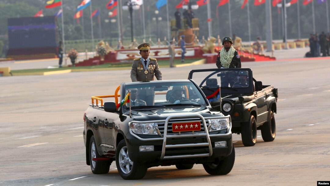 Commander-in-chief Min Aung Hlaing rides on a vehicle during a parade to mark Armed Forces Day in Myanmar's capital Naypyitaw, March 27, 2016.