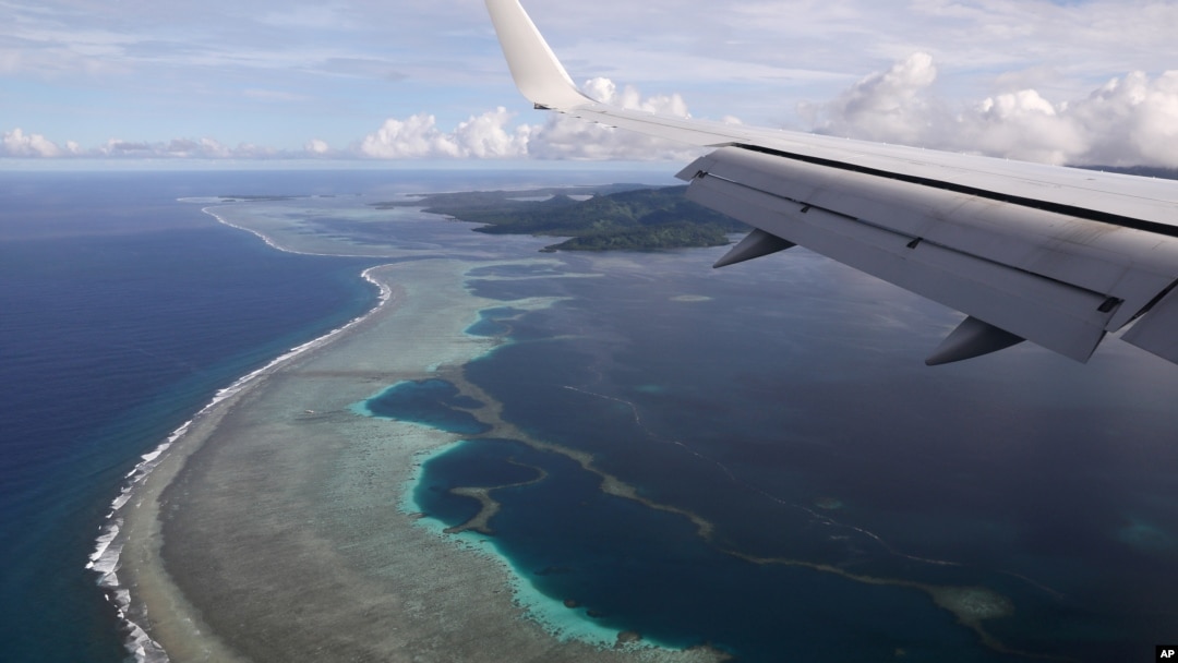 U.S. Secretary of State Mike Pompeo's plane makes its landing approach on Pohnpei International Airport in Kolonia, Federated States of Micronesia August 5, 2019. REUTERS/Jonathan Ernst/File Photo/File Photo