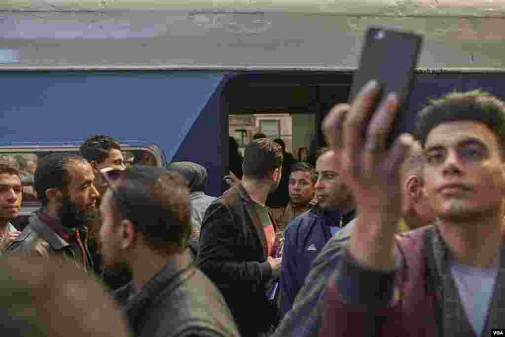 The crash photos went viral on social media. Scenes of death and destruction at the railway station did not stop many from boarding trains in the capital in the hours after the crash, Feb. 27, 2019. (H. Elrasam/VOA)