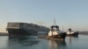 Stuck Ship Thrusts Sleepy Suez Canal Village into Limelight 