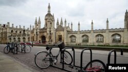 FILE - Bikes are seen outside Cambridge University amid the coronavirus pandemic, in Cambridge, Britain, April 1, 2020.