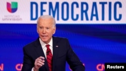 FILE - Democratic U.S. presidential candidate and former Vice President Joe Biden speaks during the 11th Democratic candidates debate of the 2020 U.S. presidential campaign, held in CNN's Washington studios.