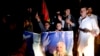 Supporters of Afghan presidential candidate Ashraf Ghani celebrate on the street after he was named president-elect in Kabul, September 21, 2014.