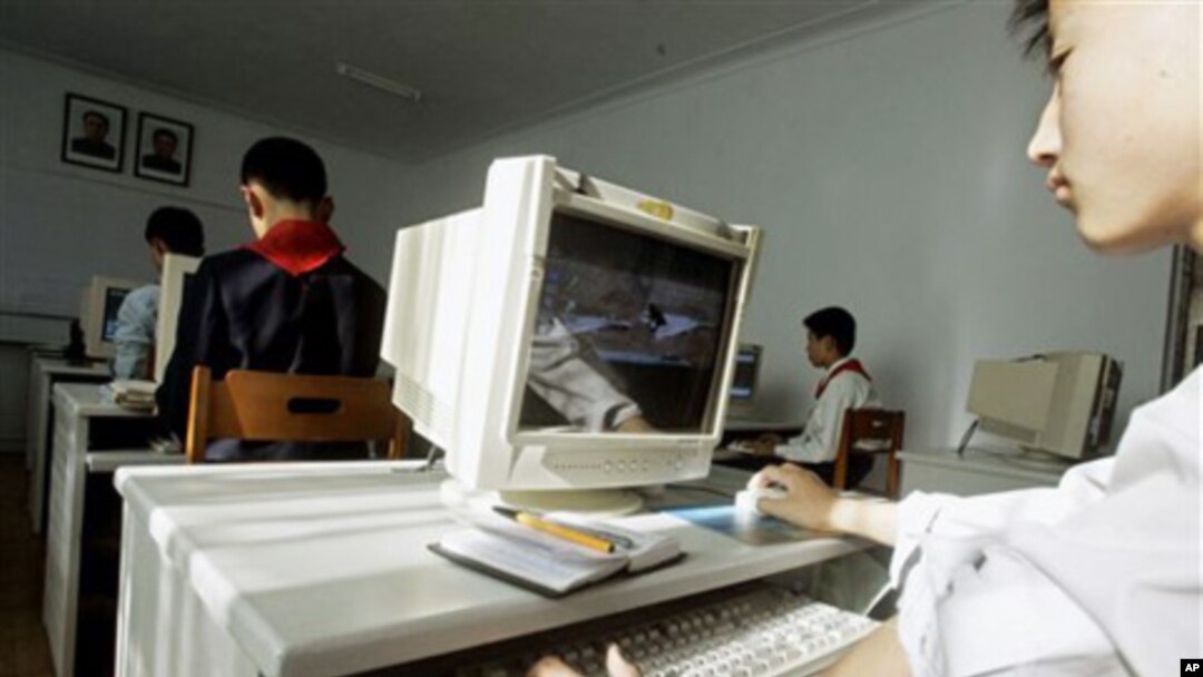 A North Korean teenager learns to use a computer which displays an image of western fighter jets at the Kumsong School, a performing arts and IT-specialist school in Pyongyang, North Korea (FILE).
