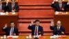 中國共產黨第十九次全國代表大會閉幕式上，中共總書記習近平和前總書記江澤民、胡錦濤等人舉手錶決（2017年10月24日）。