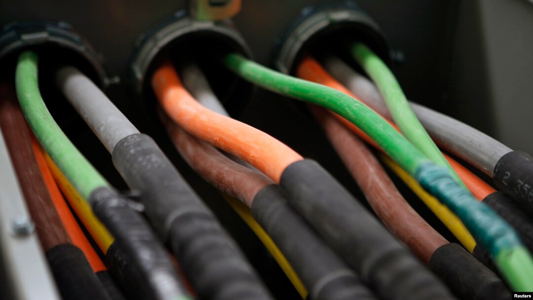 Fiber optic cables carrying internet providers are seen running into a server room at Intergate. File photo.
