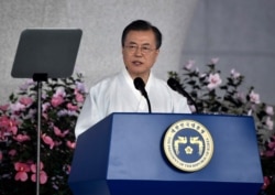 FILE - South Korean President Moon Jae-in speaks during a ceremony to mark the 74th anniversary of Korea's liberation from Japanese colonial rule, at the Independence Hall of Korea in Cheonan, Aug. 15, 2019.