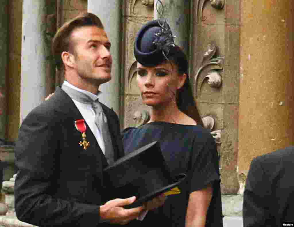 Vợ chồng Beckham đến Tu viện Westminster trước khi diễn ra lễ thành hôn của Hoàng tử Anh William và Kate Middleton, London, ngày 29 tháng 4, 2011.