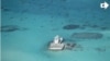 FILE - In this photo taken Feb. 28, 2013 by a surveillance plane, and released Thursday, May 15, 2014, by the Philippine Department of Foreign Affairs, Chinese-made structures stands on the Johnson Reef.
