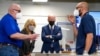 President Joe Biden and first lady Jill Biden tour an HVAC workshop at Tidewater Community College, May 3, 2021, in Portsmouth, Va. Harlan "Skip" Krepcik, who teaches about heating, ventilation and air-conditioning systems, is at left. 