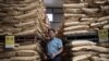 FILE - Hebei Dawu Agricultural and Animal Husbandry Group founder Sun Dawu stands at a feed warehouse in Hebei, outside Beijing, Sept. 24, 2019.