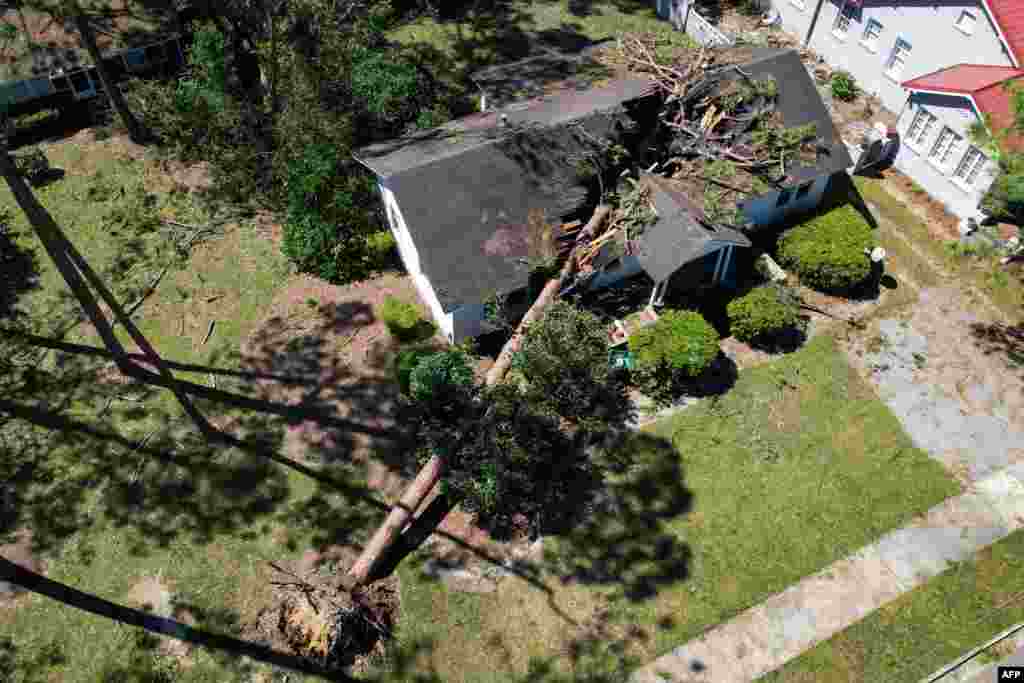 An aerial picture taken on Sept. 28, 2024, shows storm damage in the aftermath of Hurricane Helene in Valdosta, Georgia. At least 44 people died across five U.S. states battered by powerful storm Helene, authorities said, after torrential flooding prompted emergency responders to launch massive rescue operations.