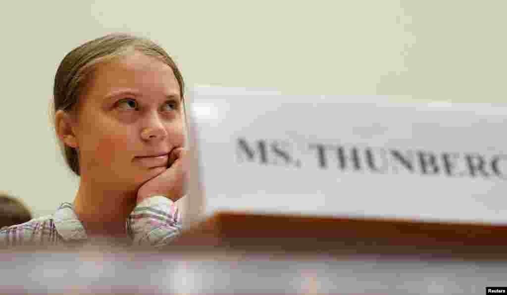 Sixteen-year-old Swedish climate activist Greta Thunberg testifies at a House Foreign Affairs subcommittee and House Select Climate Crisis Committee joint hearing on "Voices Leading the Next Generation on the Global Climate Crisis" on Capitol Hill in Washington.