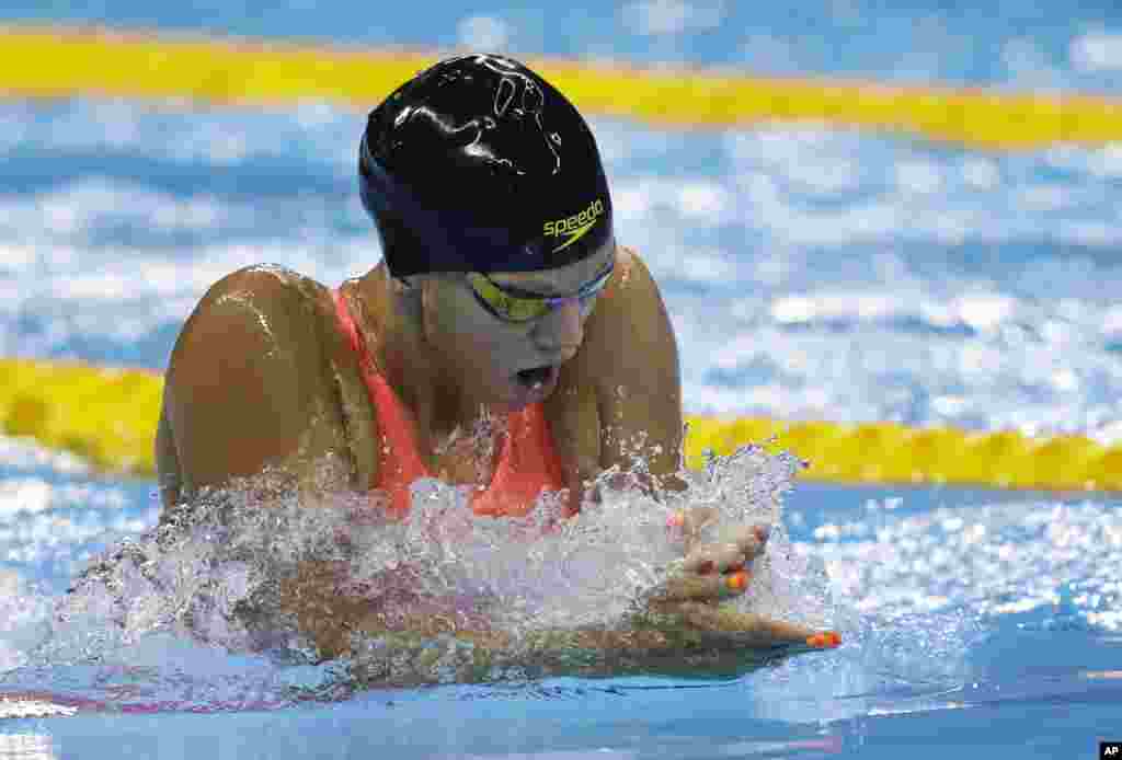 Russia's Yulia Efimova competes in a women's 100-breaststroke heat during the swimming competitions at the 2016 Summer Olympics, Aug. 7, 2016.