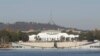 FILE - Australia's Parliament House sits behind Lake Burley Griffin in Canberra, Australia, Thursday, April 24, 2008. 